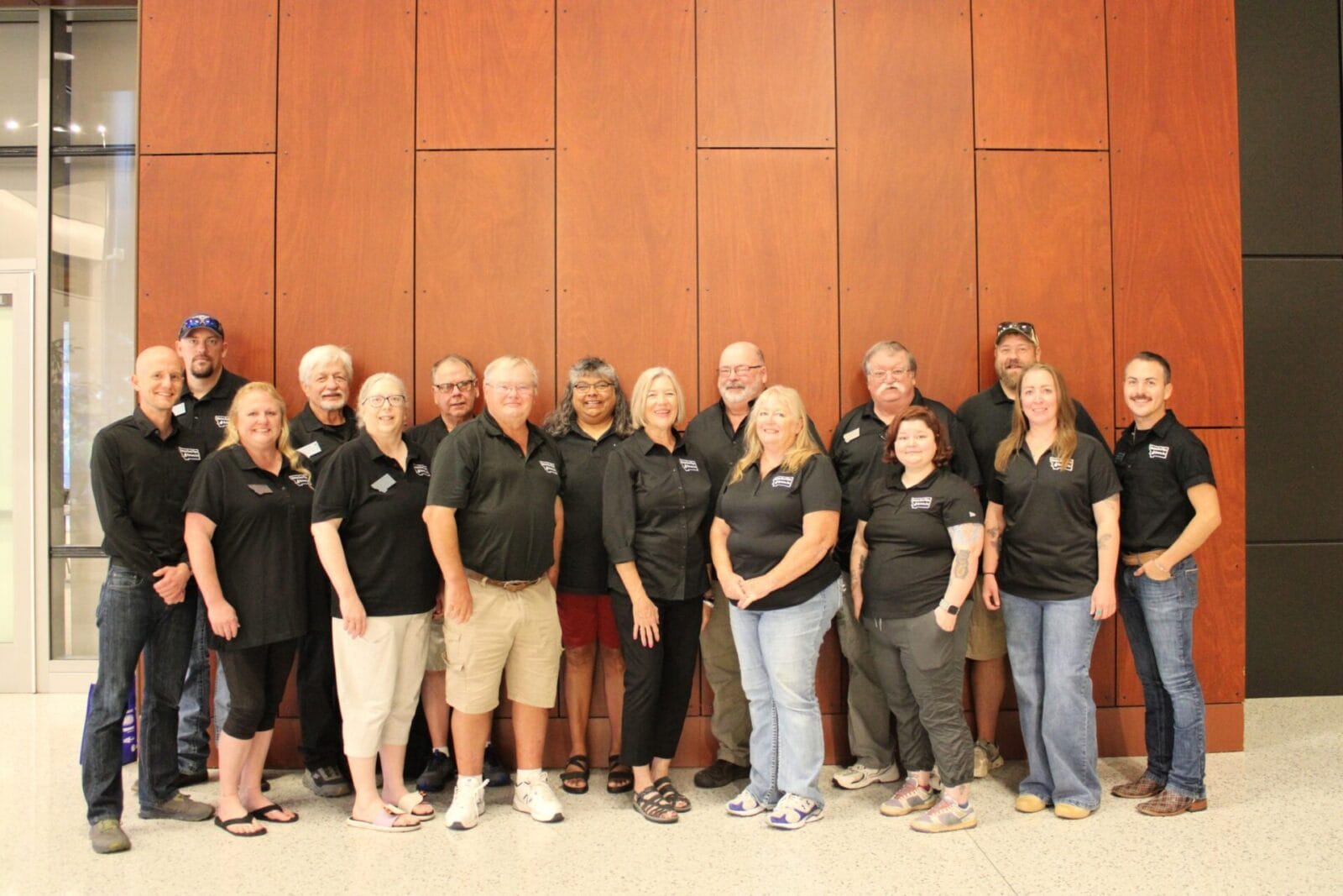 The MRWS staff together in matching black shirts